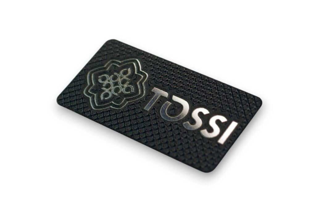 tabliczka logo do oznaczania produktów TOSSI