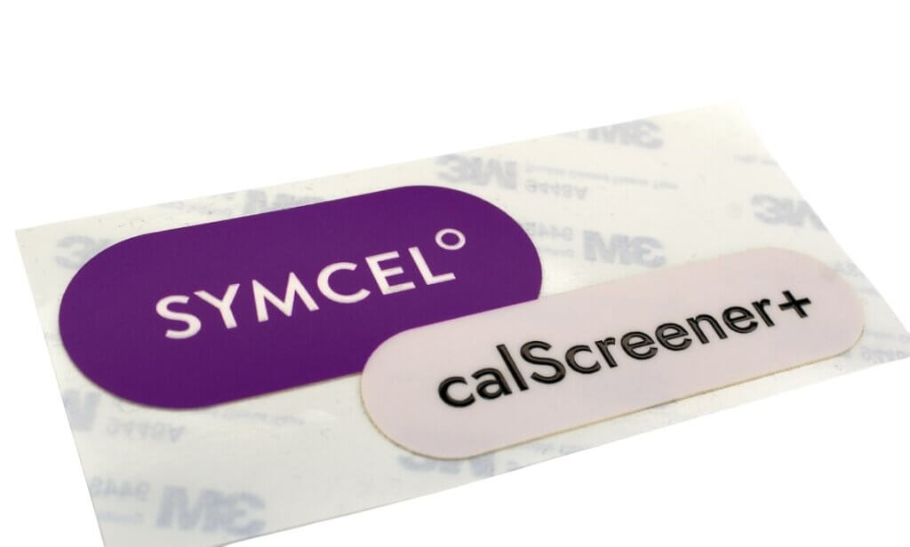 Two-color logo plate for product elements for Symcel