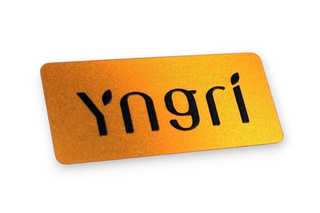 Rectangular gold metallic product brand plate with Yngri logo